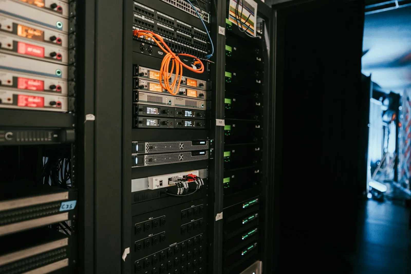 Rack of servers with active disks in a server room